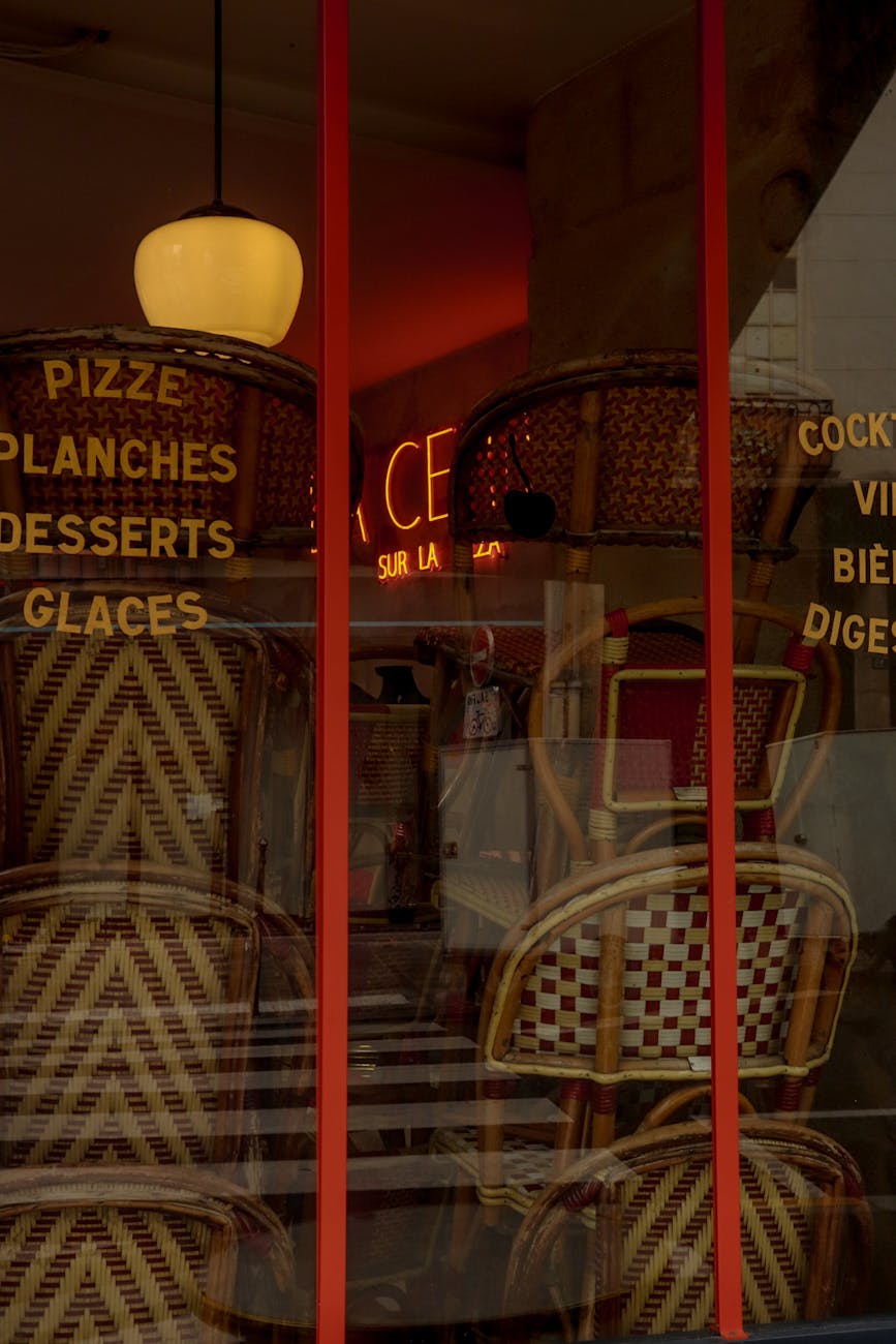 a window display with a sign that says desserts