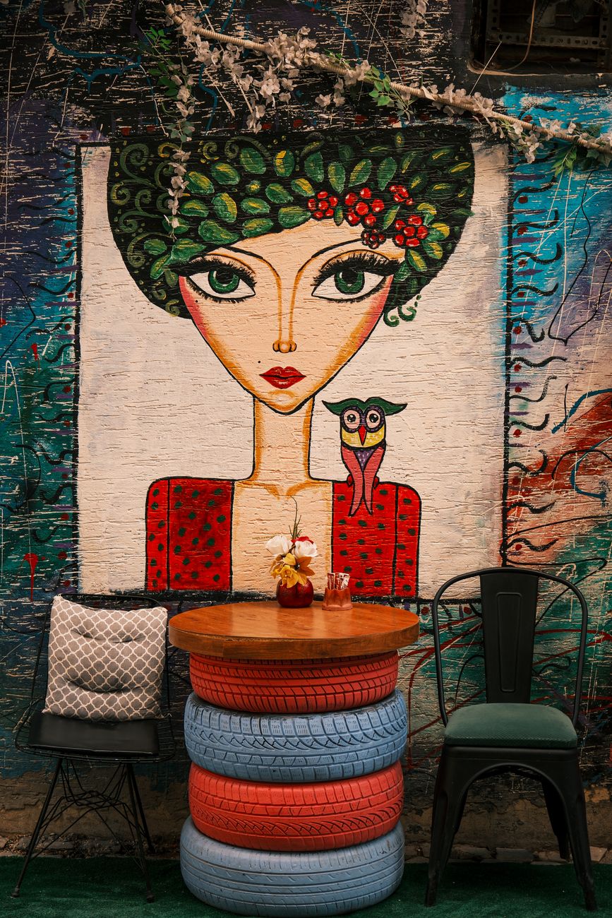 colorful street art with vintage seating